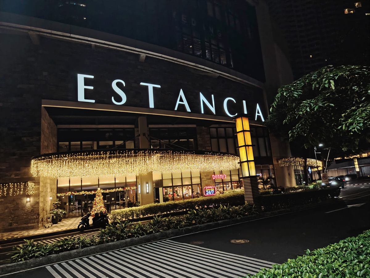Estancia mall at Capitol Commons in Pasig City at night, lit with holiday lights